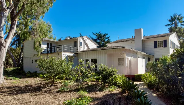 a backyard of a house with lots of green space