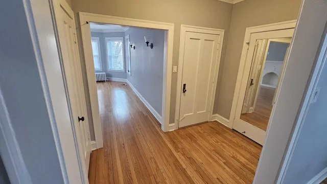 a kitchen with stainless steel appliances a refrigerator a stove a sink and a refrigerator