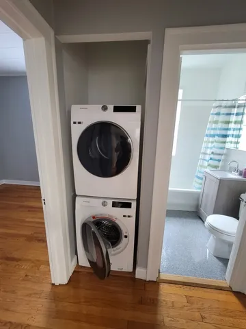 a view of a hardwood floor and a fireplace