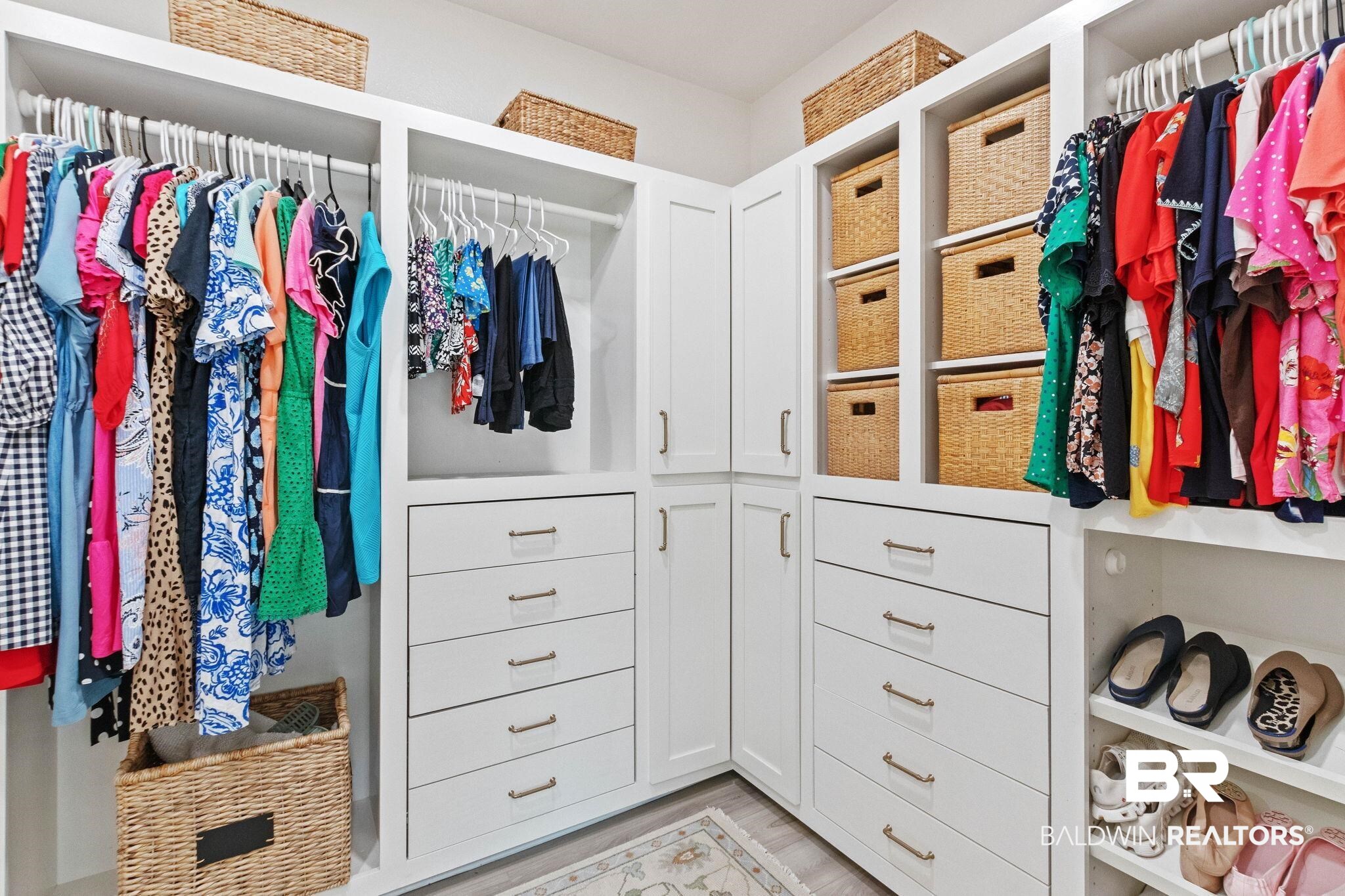 9815 Lakeview Drive Foley, AL 36535 - Photo 40 of 100 Walk in closet featuring light hardwood / wood-style floors