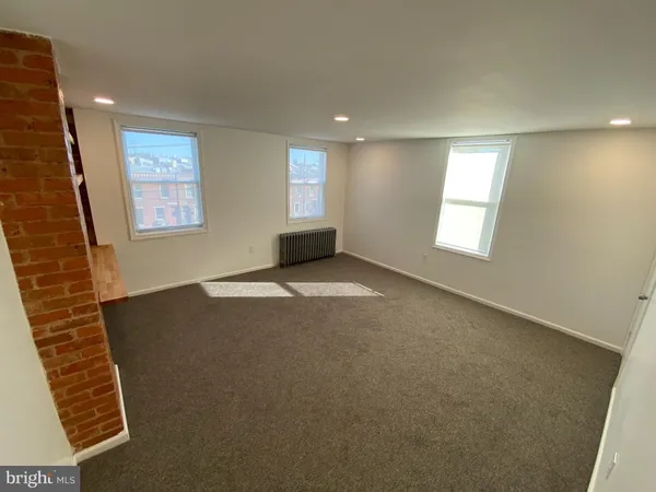 a view of livingroom with hardwood floor and window