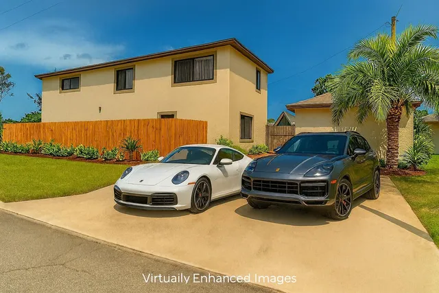 a car parked in front of a house