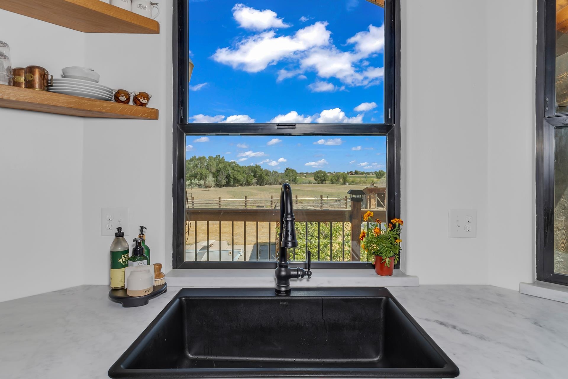 1874 L Road Fruita, CO 81521 - Photo 13 of 42 a kitchen with a sink and a window