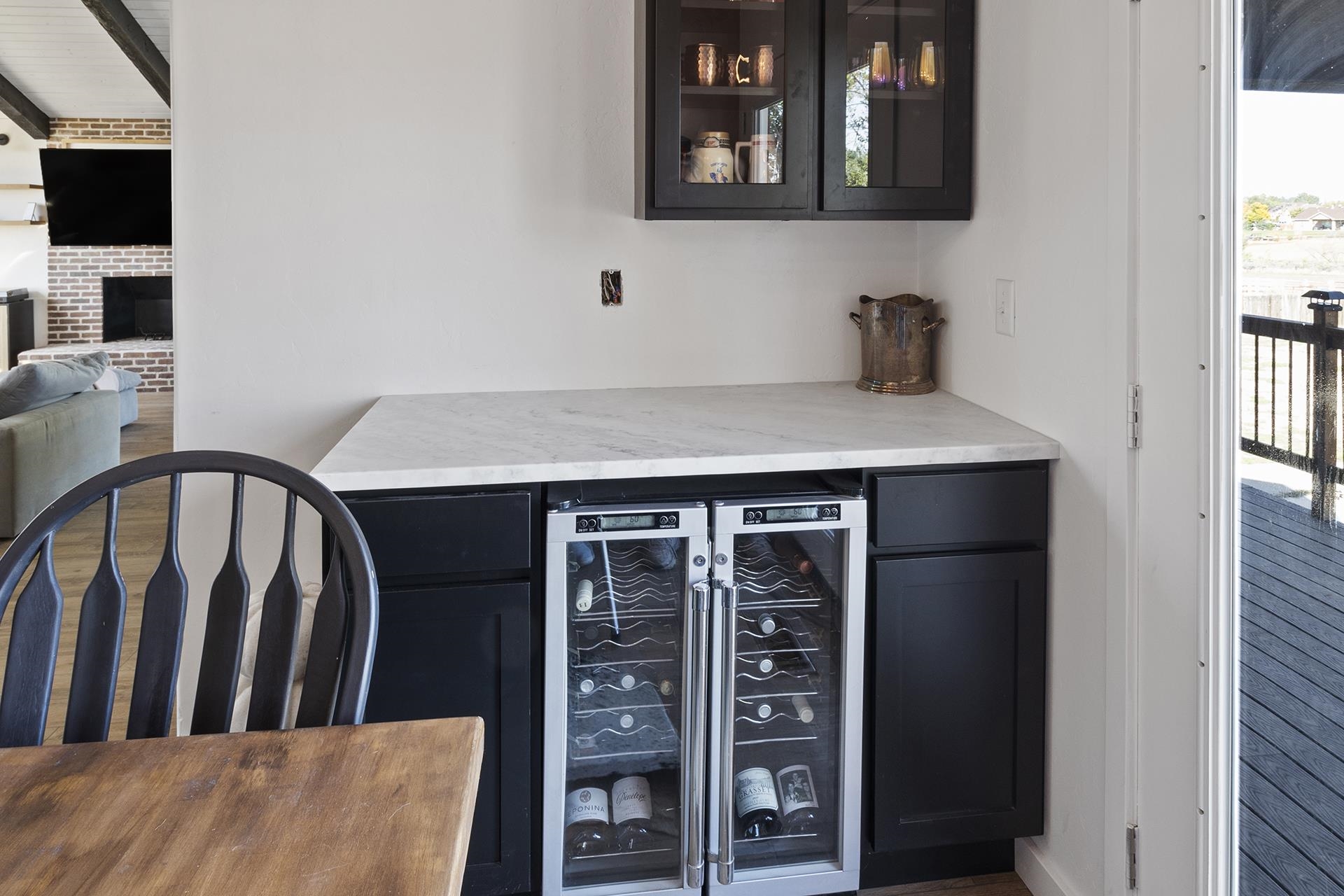 1874 L Road Fruita, CO 81521 - Photo 17 of 42 a kitchen with a wooden floor and cabinets