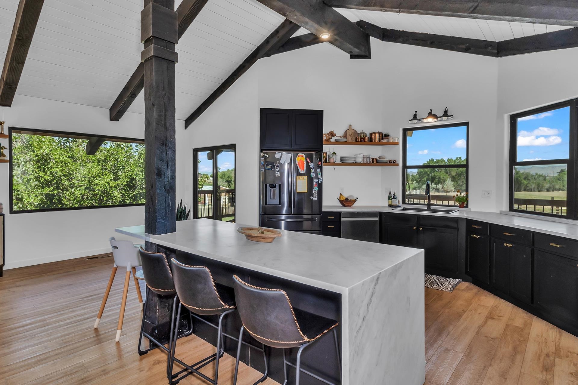 1874 L Road Fruita, CO 81521 - Photo 8 of 42 a kitchen with a table and chairs in it