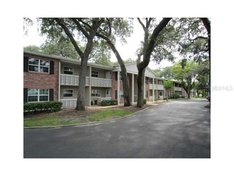2500 Lee Road, Unit 206 Winter Park, FL 32789 - Photo 1 of 1 a black and white house with a yard