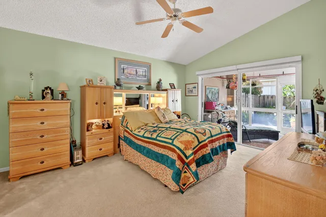 a bathroom with a shower and a toilet