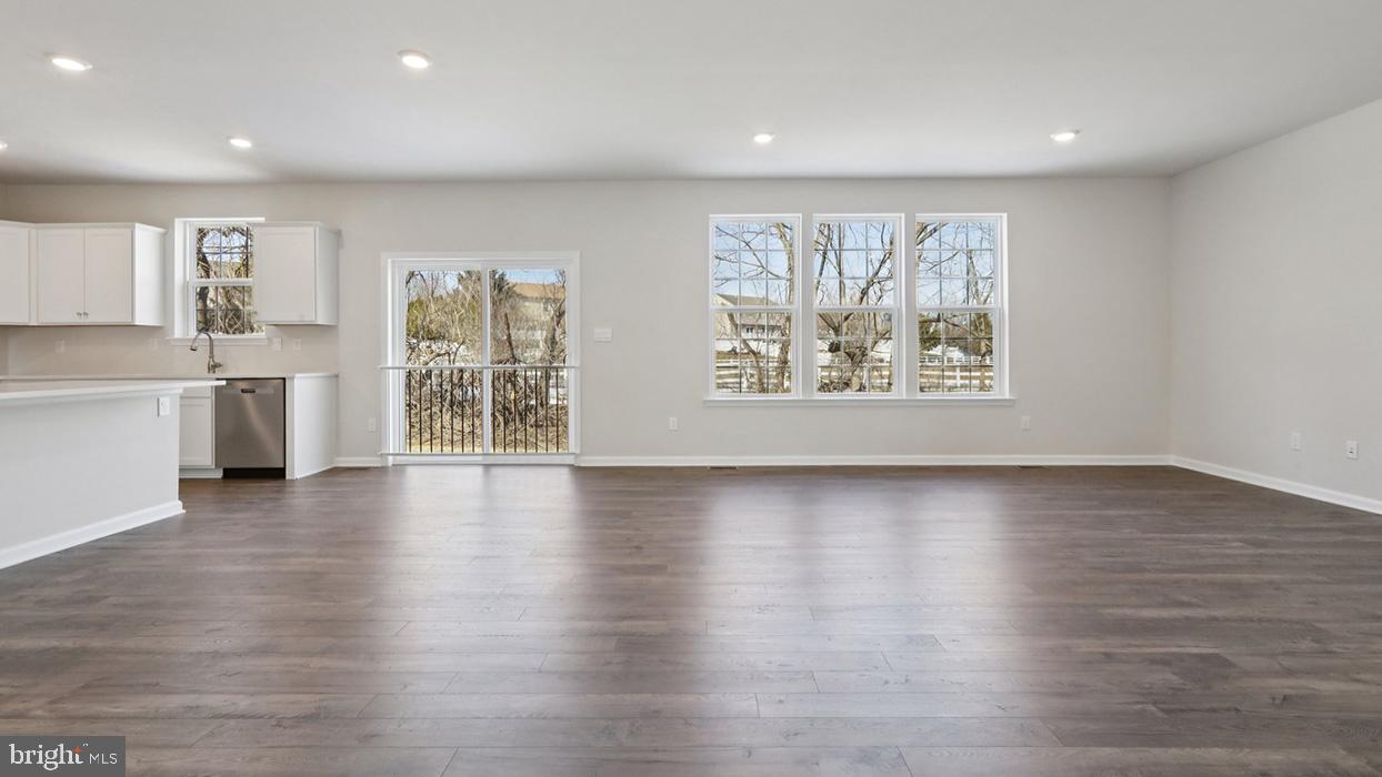 120 Winding Road Easton, PA 18040 - Photo 20 of 80 an empty room with wooden floor and windows