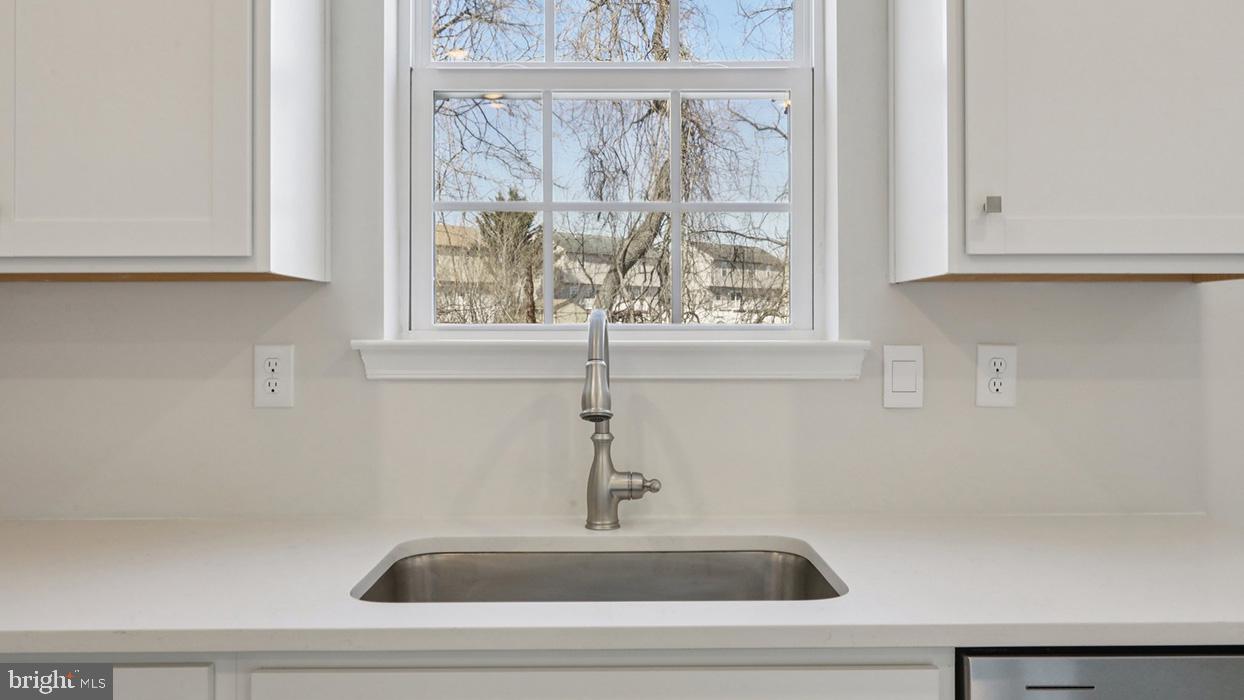 120 Winding Road Easton, PA 18040 - Photo 30 of 80 a bathroom with a sink and cabinets