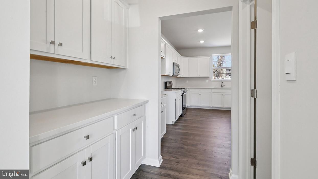 120 Winding Road Easton, PA 18040 - Photo 36 of 80 a view of a kitchen with white cabinets