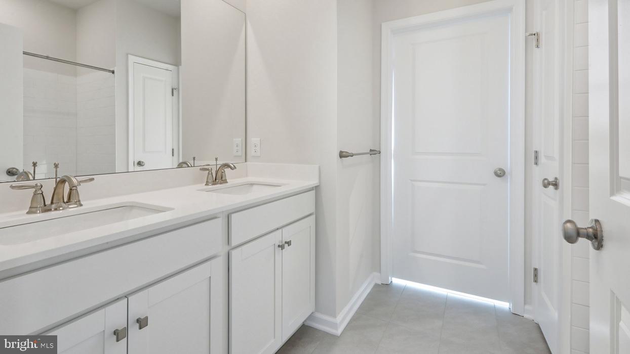 120 Winding Road Easton, PA 18040 - Photo 63 of 80 a bathroom with a sink and a mirror