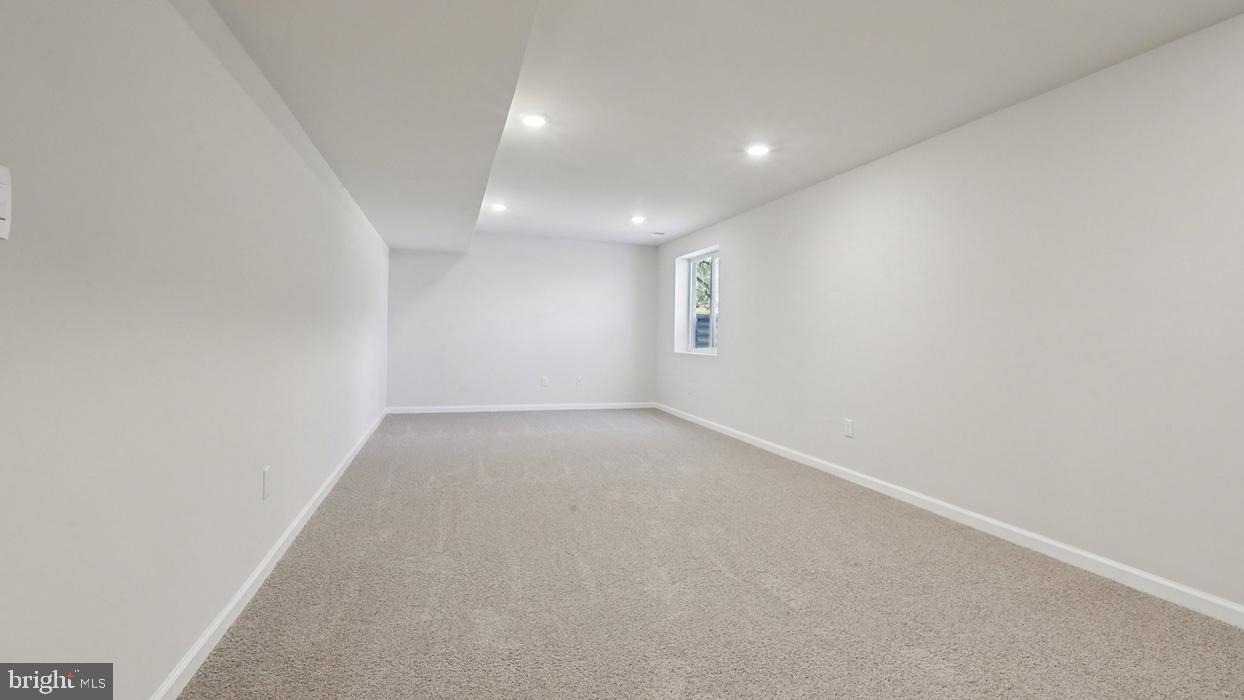 120 Winding Road Easton, PA 18040 - Photo 77 of 80 an empty room with a empty space and windows