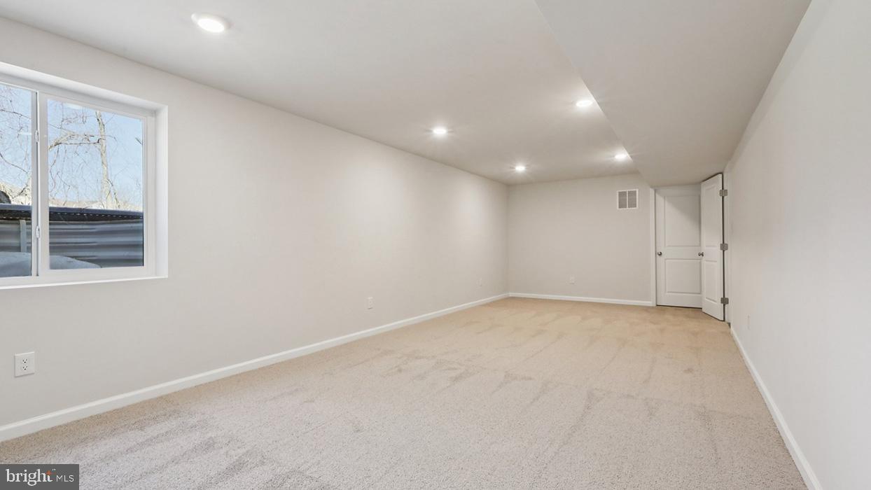 120 Winding Road Easton, PA 18040 - Photo 79 of 80 a view of an empty room with a window