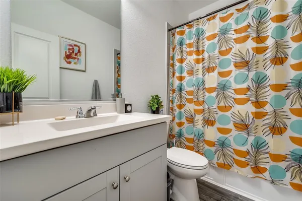 a bathroom with a sink and a toilet