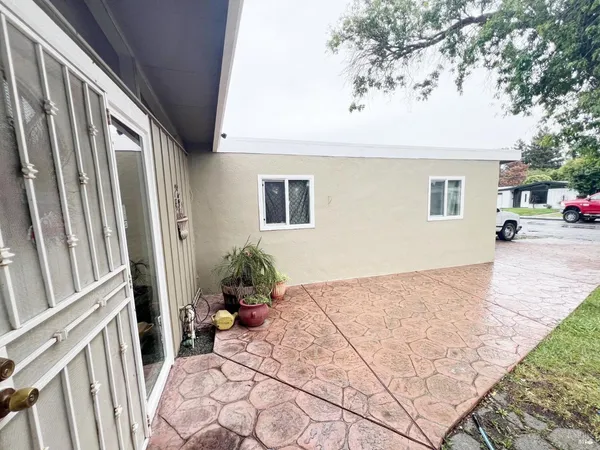 a house view with a backyard space