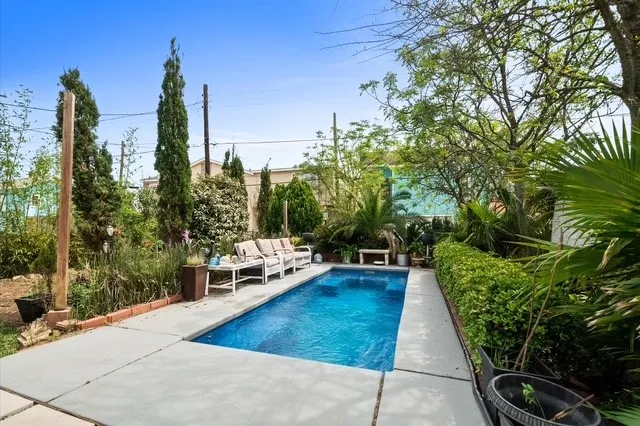 a view of a balcony with chairs