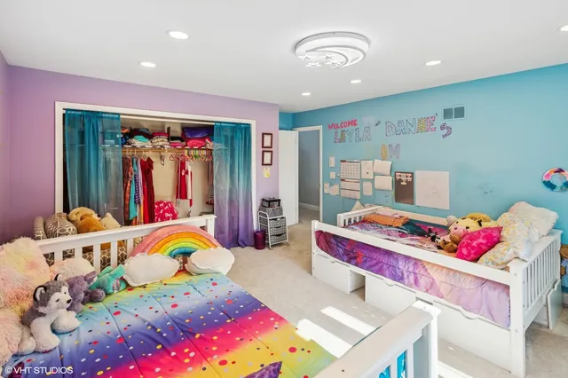 a bedroom with furniture and a bed