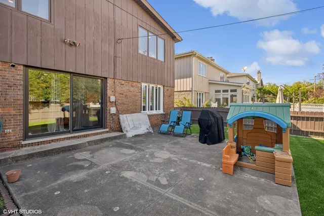 a front view of a house with patio