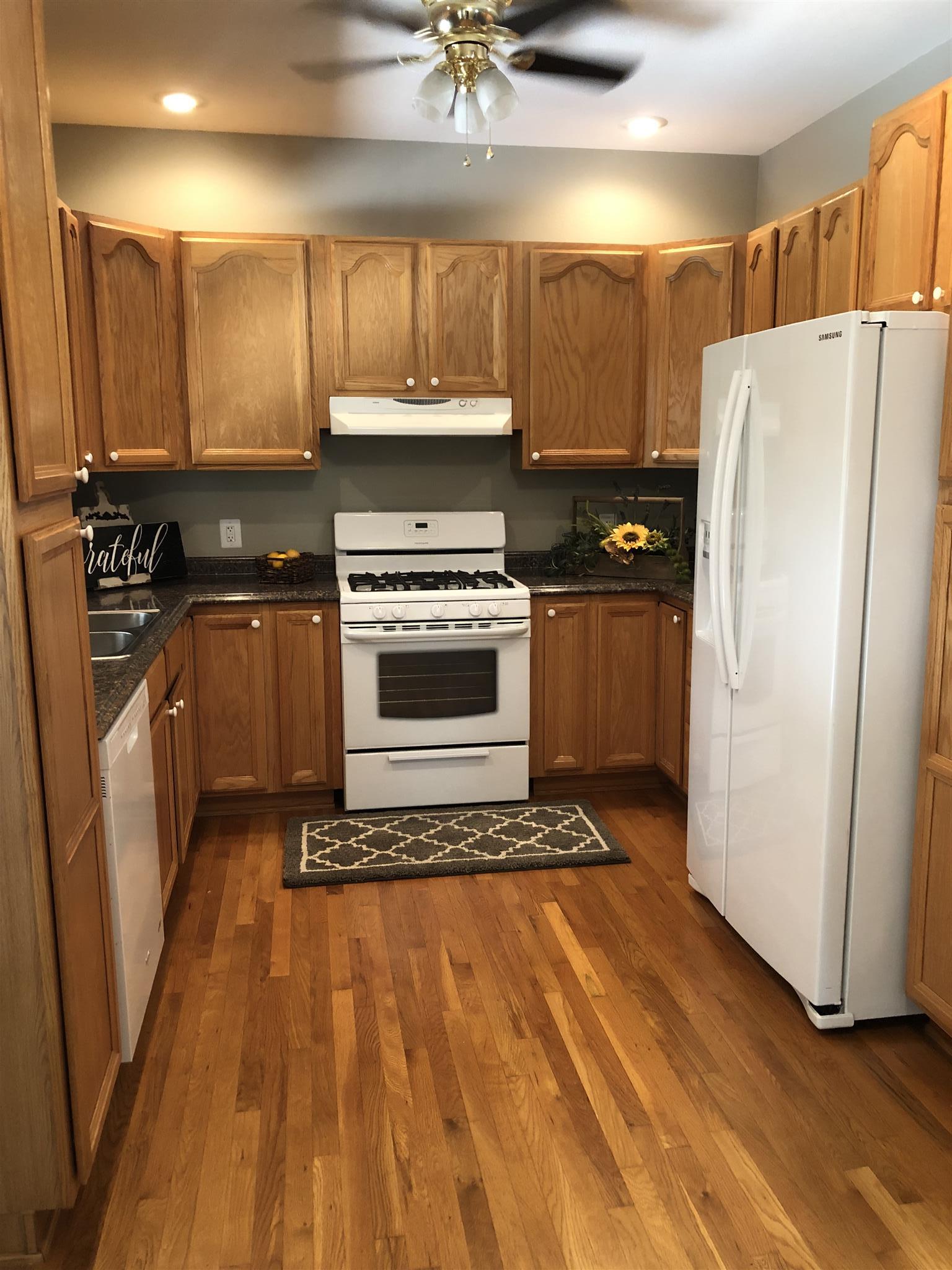 112 Fredonia Road Manchester, TN 37355 - Photo 2 of 8 A cozy galley kitchen has abundant cabinets for storage.