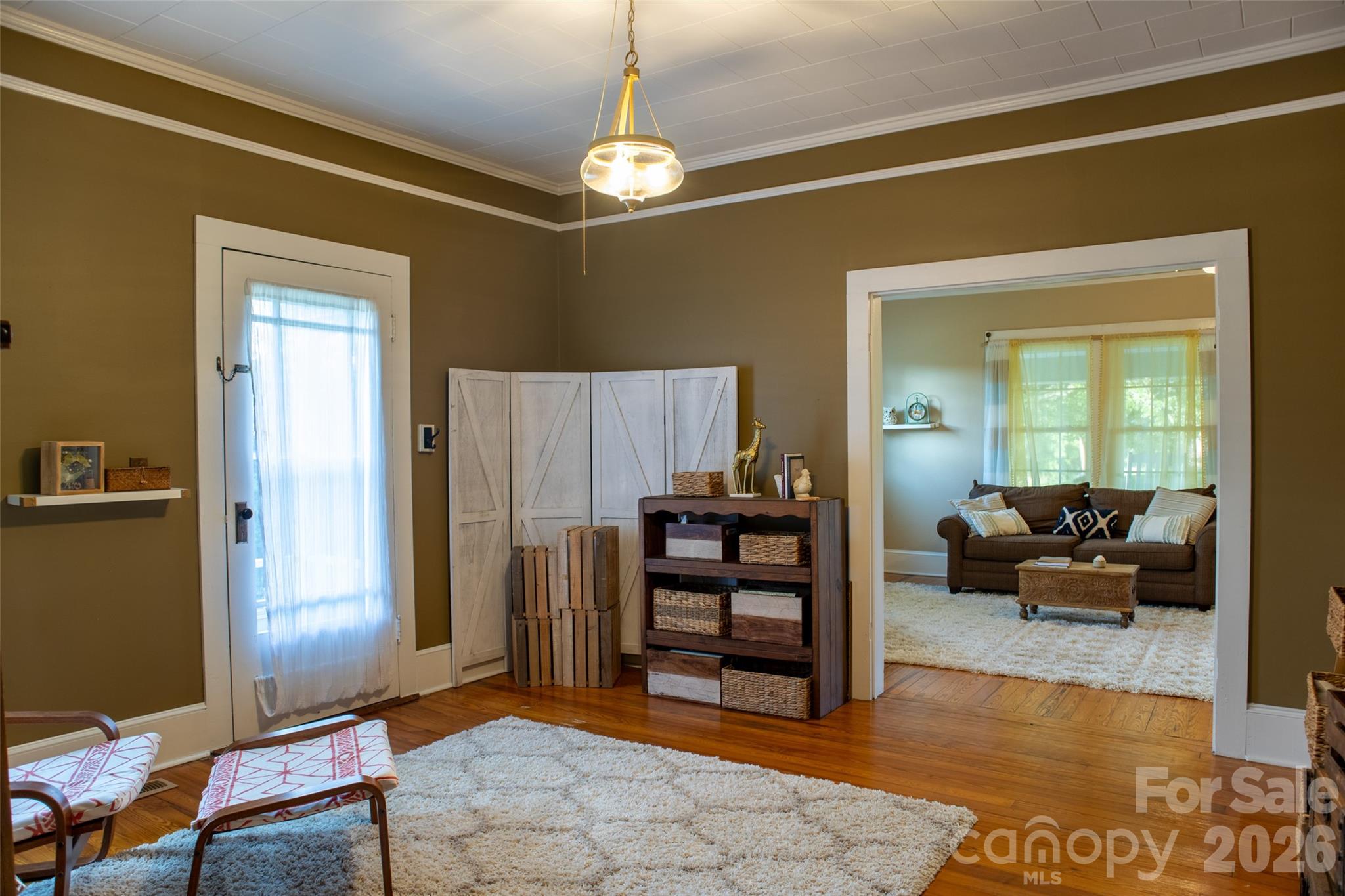 102 Cuthberson Street Morganton, NC 28655 - Photo 11 of 45 a view of a livingroom with furniture and an entryway