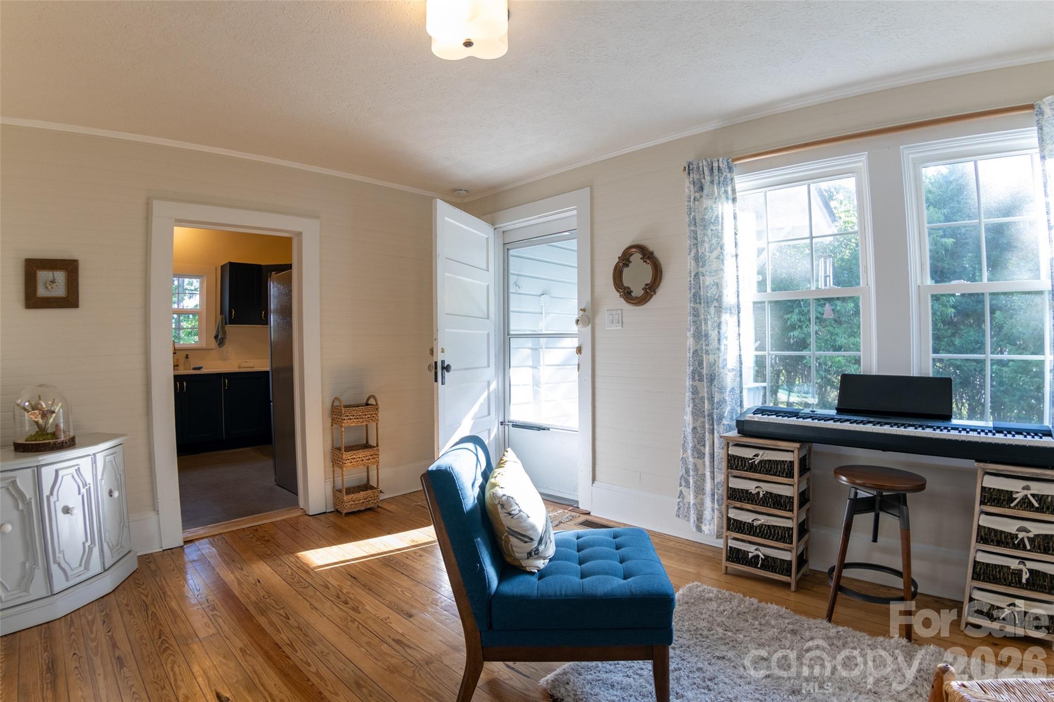 102 Cuthberson Street Morganton, NC 28655 - Photo 12 of 45 a living room with furniture and wooden floor