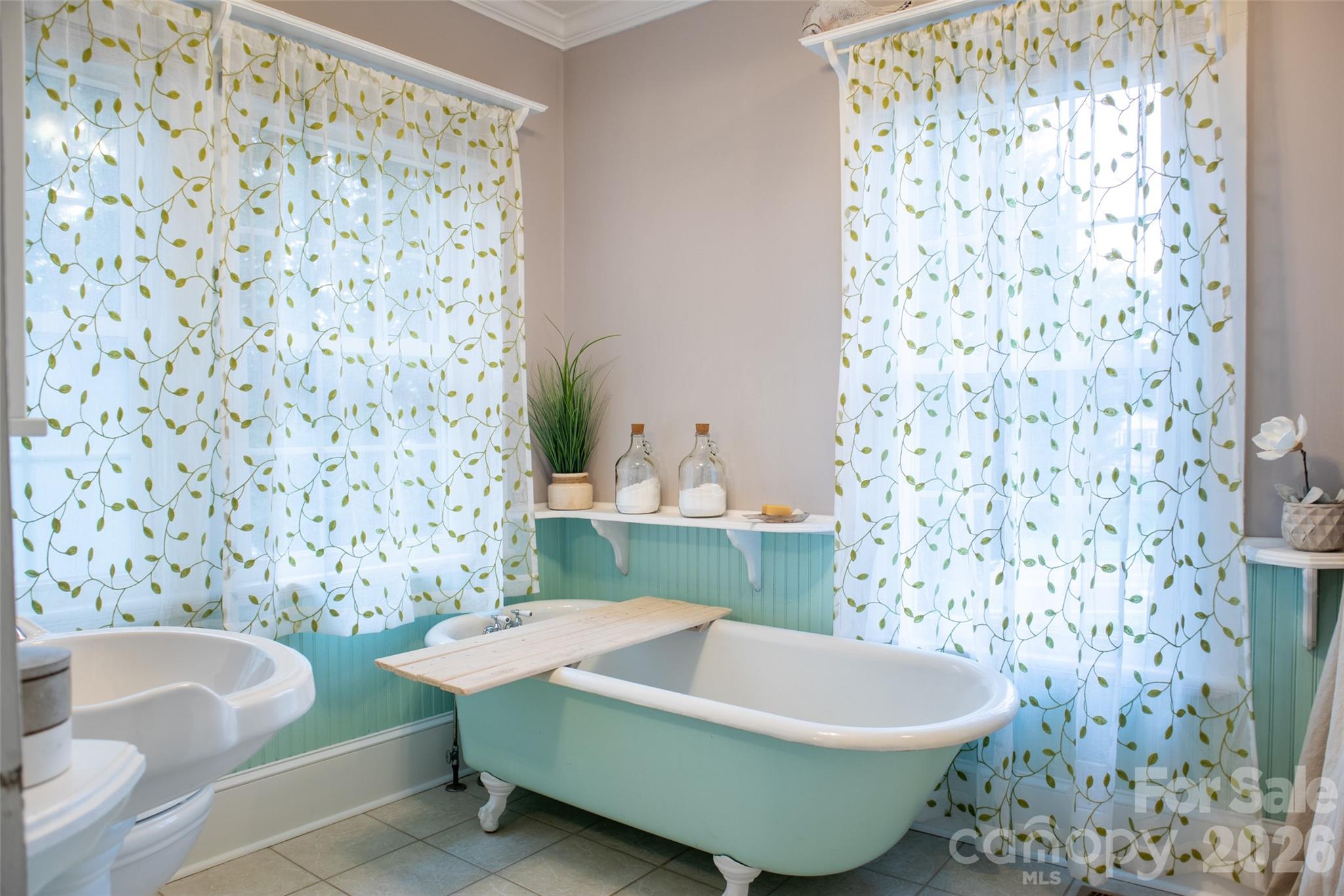 102 Cuthberson Street Morganton, NC 28655 - Photo 15 of 45 a bathroom with a sink and a bathtub