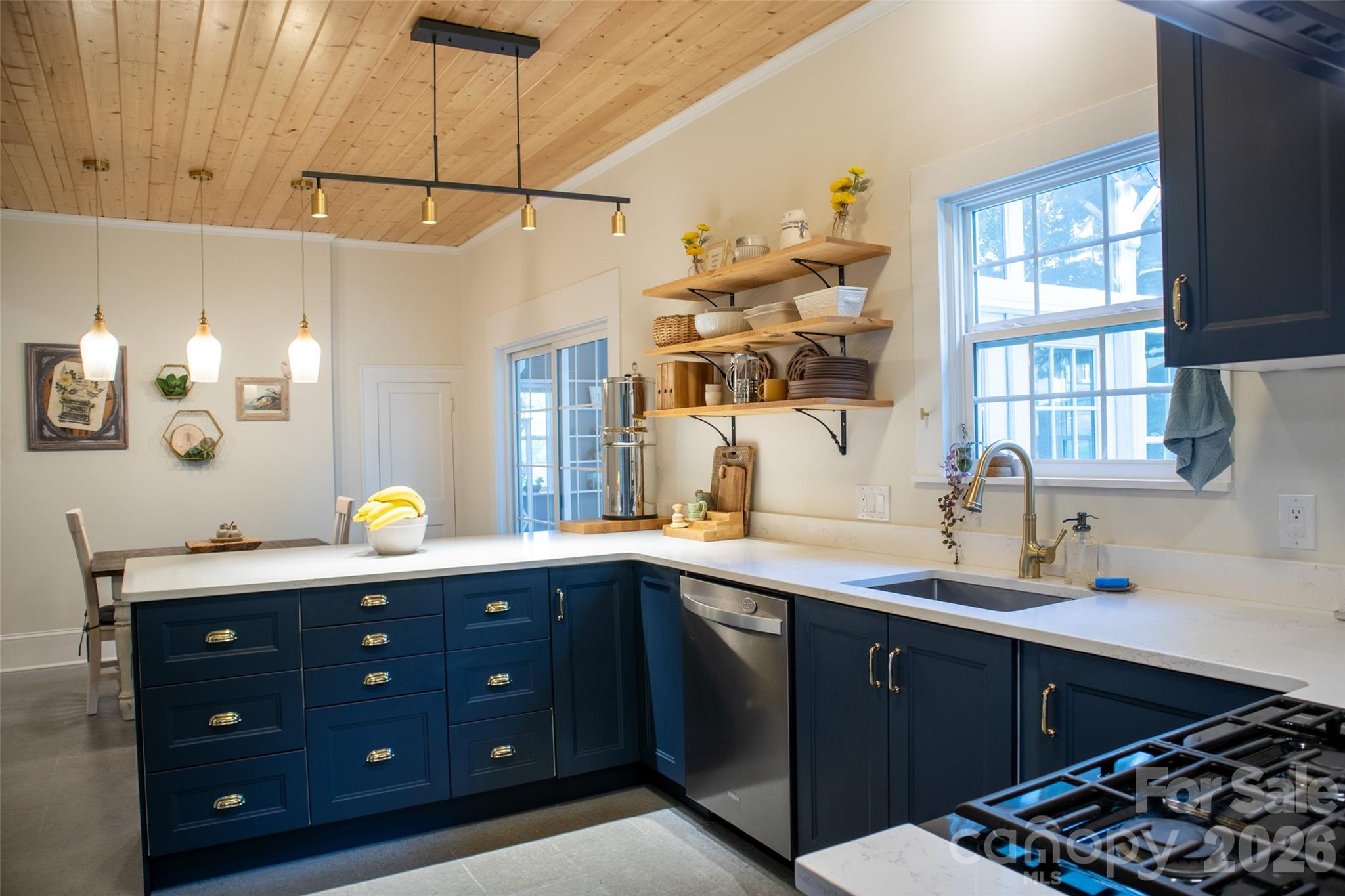102 Cuthberson Street Morganton, NC 28655 - Photo 18 of 45 a kitchen with a sink and cabinets