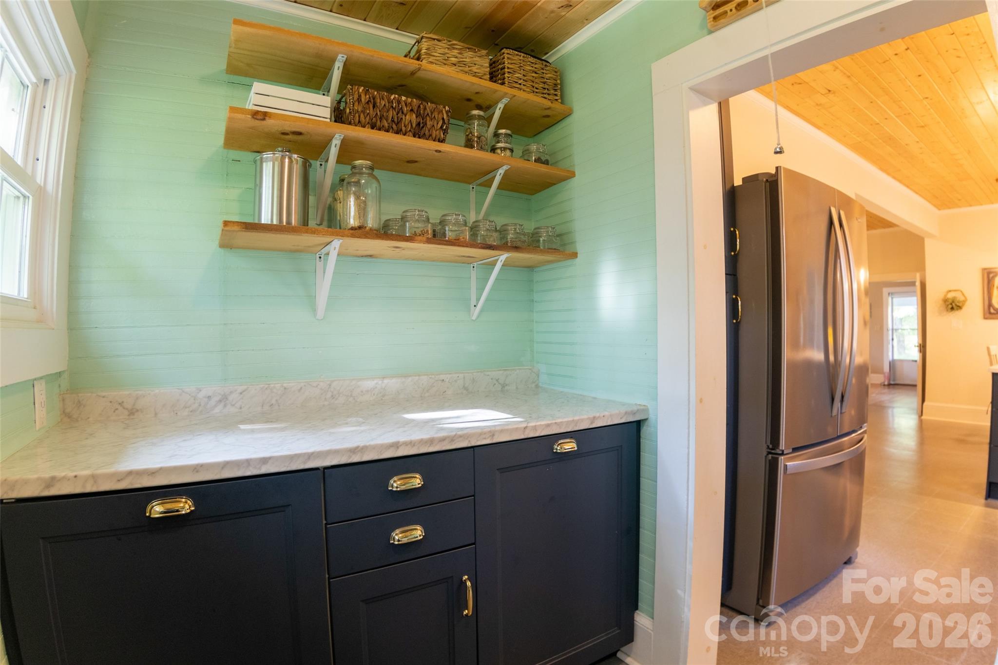 102 Cuthberson Street Morganton, NC 28655 - Photo 22 of 45 a view of a bathroom with a sink and a mirror
