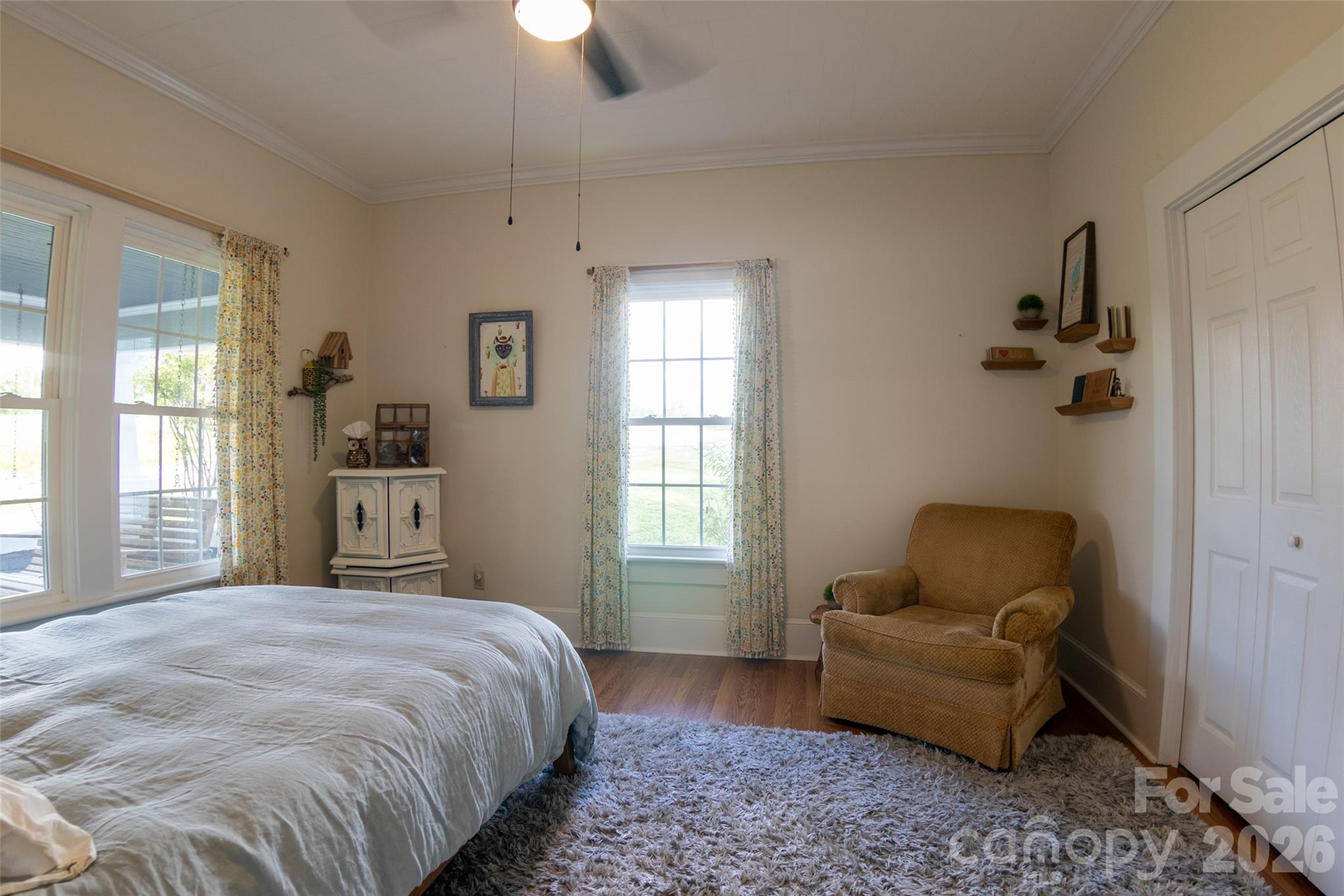 102 Cuthberson Street Morganton, NC 28655 - Photo 24 of 45 a bedroom with bed chair and window