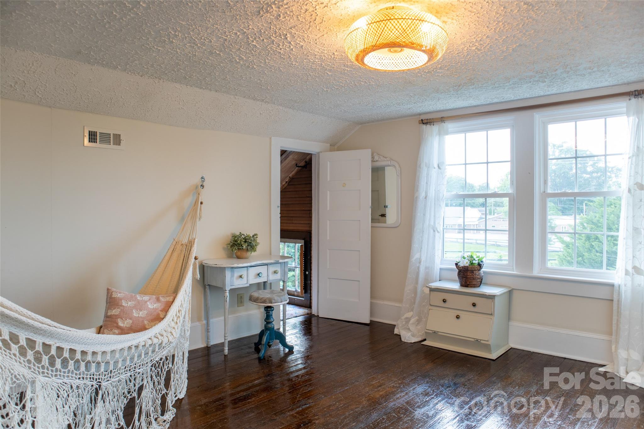 102 Cuthberson Street Morganton, NC 28655 - Photo 27 of 45 a living room with furniture and a window