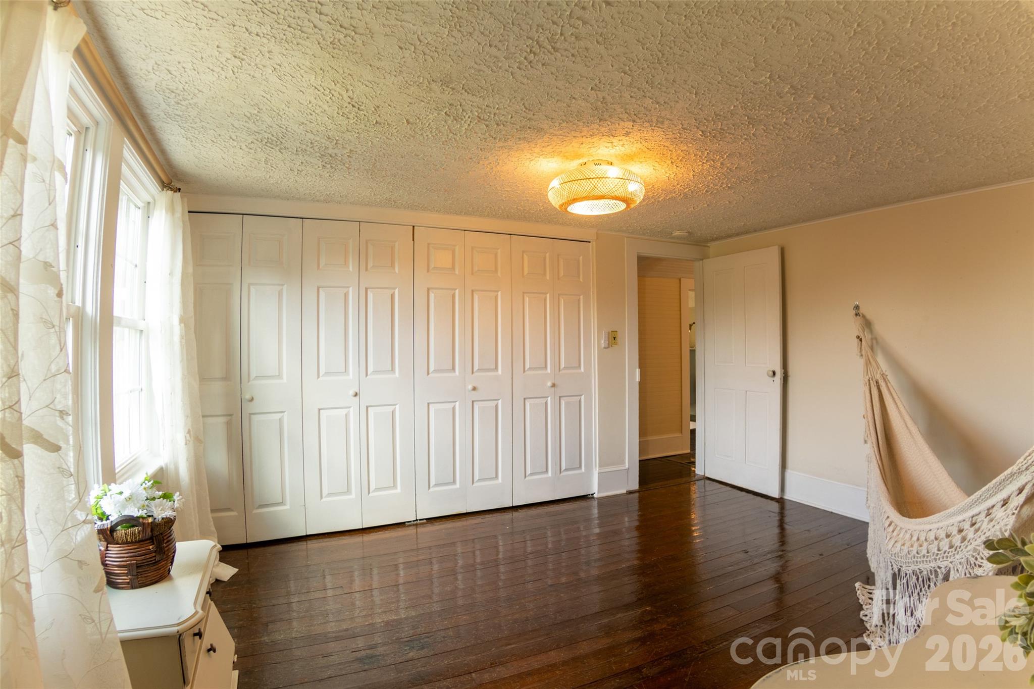 102 Cuthberson Street Morganton, NC 28655 - Photo 28 of 45 a view of entryway with wooden floor