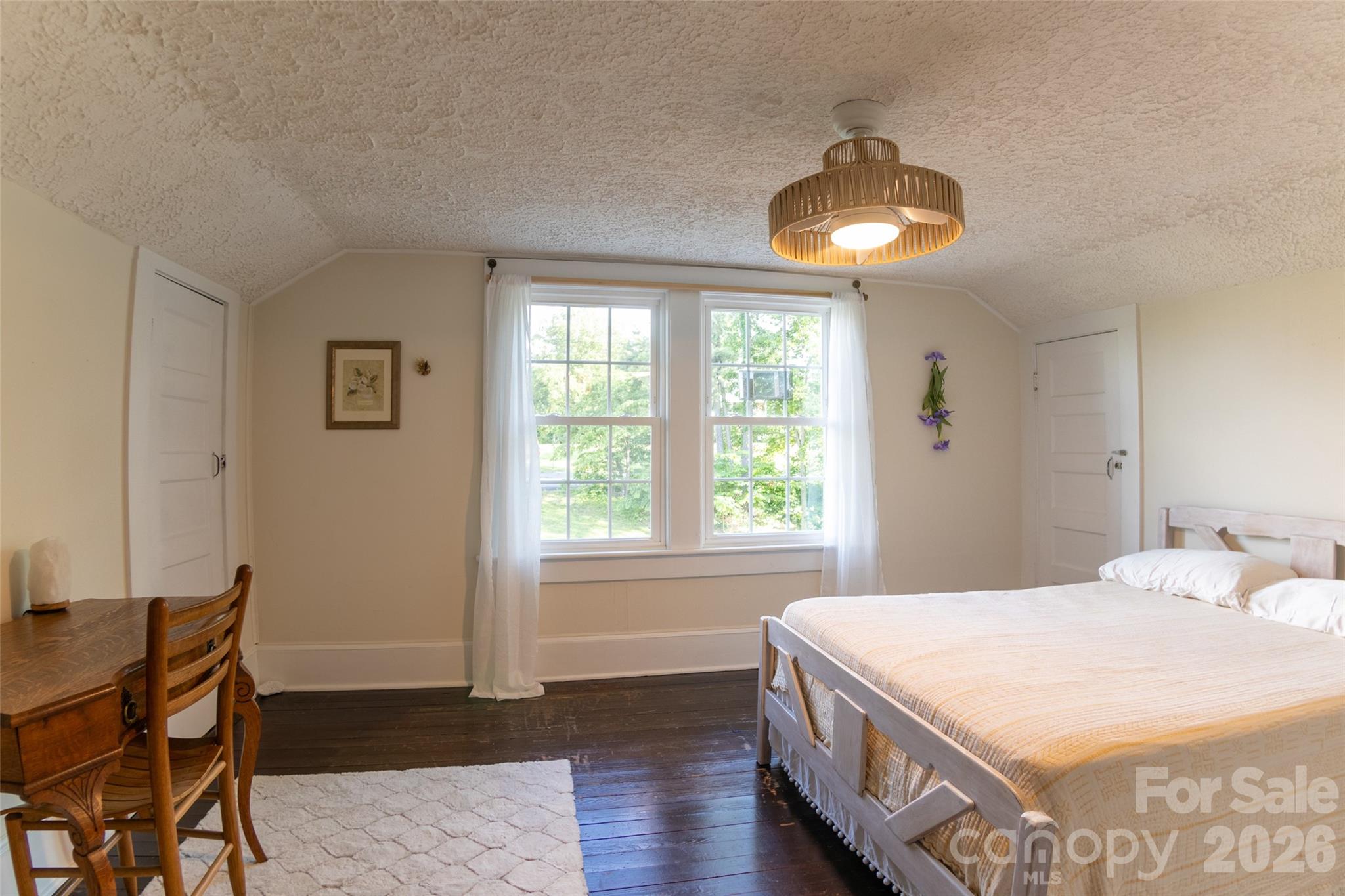 102 Cuthberson Street Morganton, NC 28655 - Photo 29 of 45 a spacious bedroom with a bed and a window