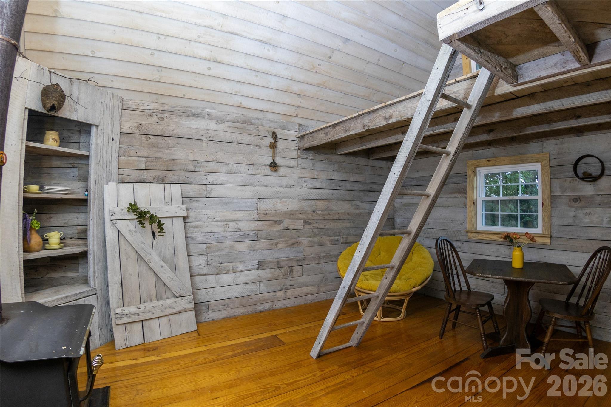 102 Cuthberson Street Morganton, NC 28655 - Photo 44 of 45 a view of an chairs and tables in the balcony
