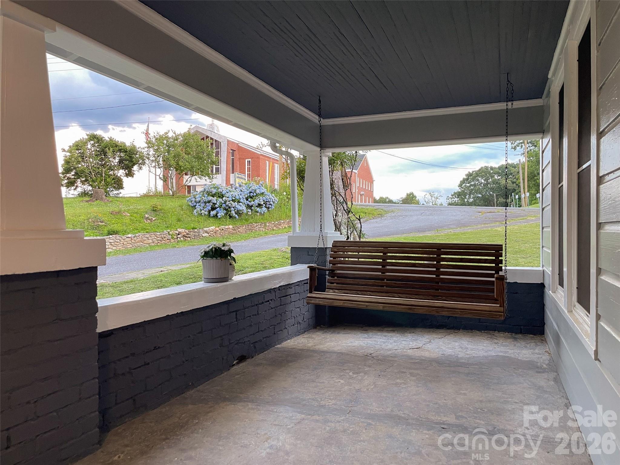 102 Cuthberson Street Morganton, NC 28655 - Photo 5 of 45 a view of a two chairs in the balcony