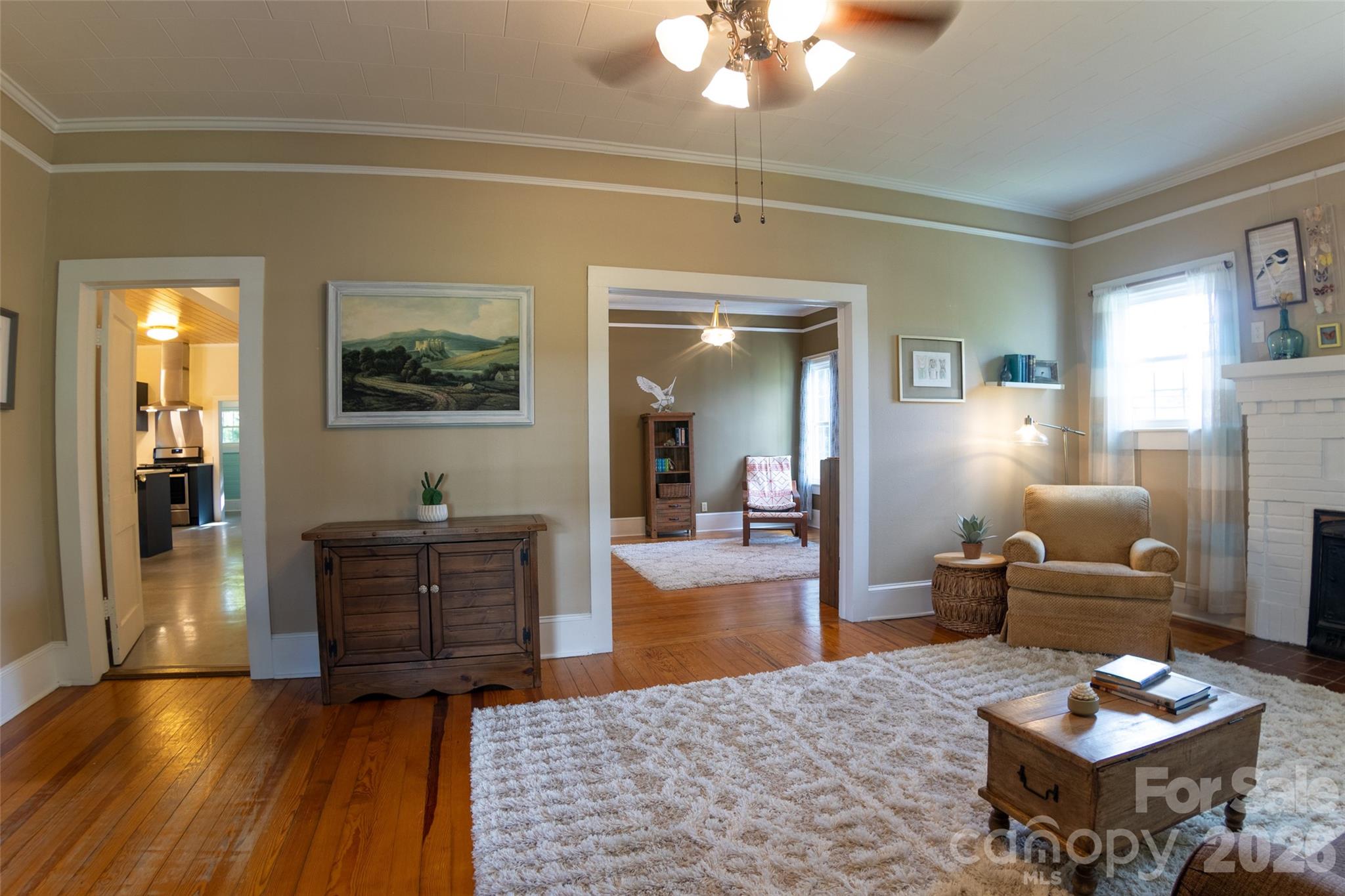 102 Cuthberson Street Morganton, NC 28655 - Photo 6 of 45 a living room with furniture and a wooden floor