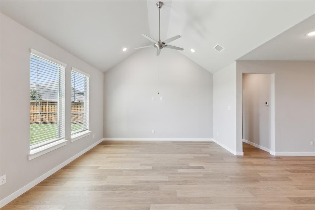 676 Poppy Lane Lavon, TX 75166 - Photo 17 of 35 Living room in the Masters home plan by Trophy Signature Homes – REPRESENTATIVE PHOTO