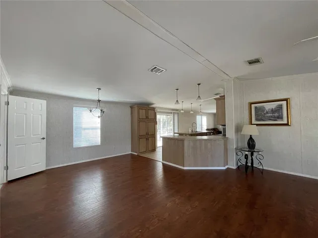 a bathroom with a shower and a sink