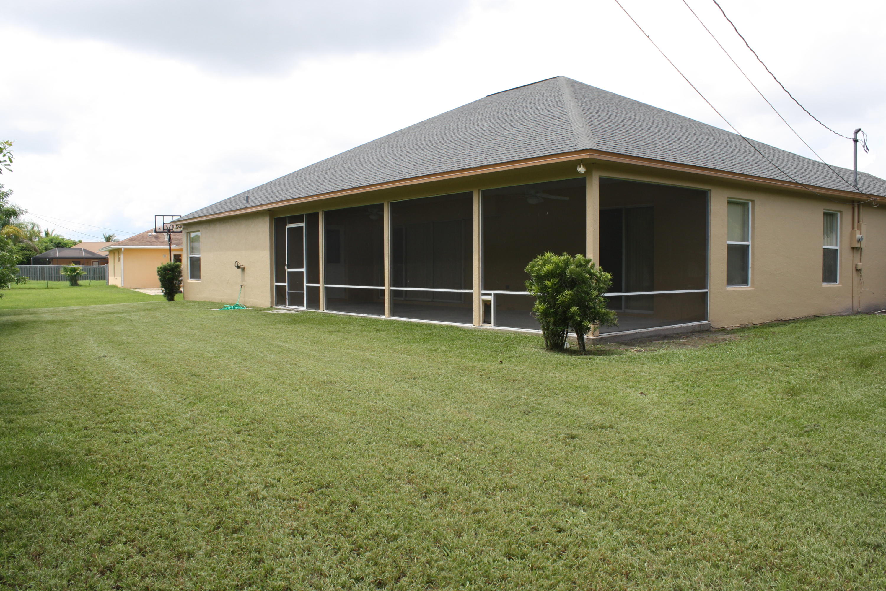 3067 Southeast Wake Road Port St. Lucie, FL 34984 - Photo 3 of 21 Back Yard with Patio