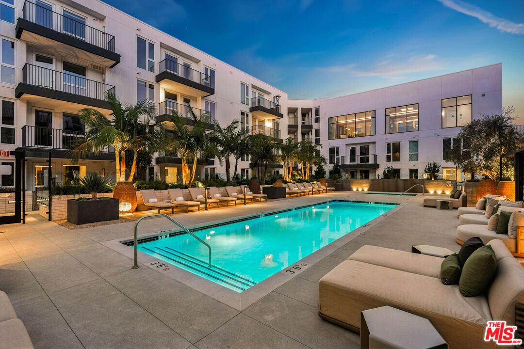 2455 Overland Avenue, Unit 564 Los Angeles, CA 90064 - Photo 5 of 23 a view of pool with outdoor seating