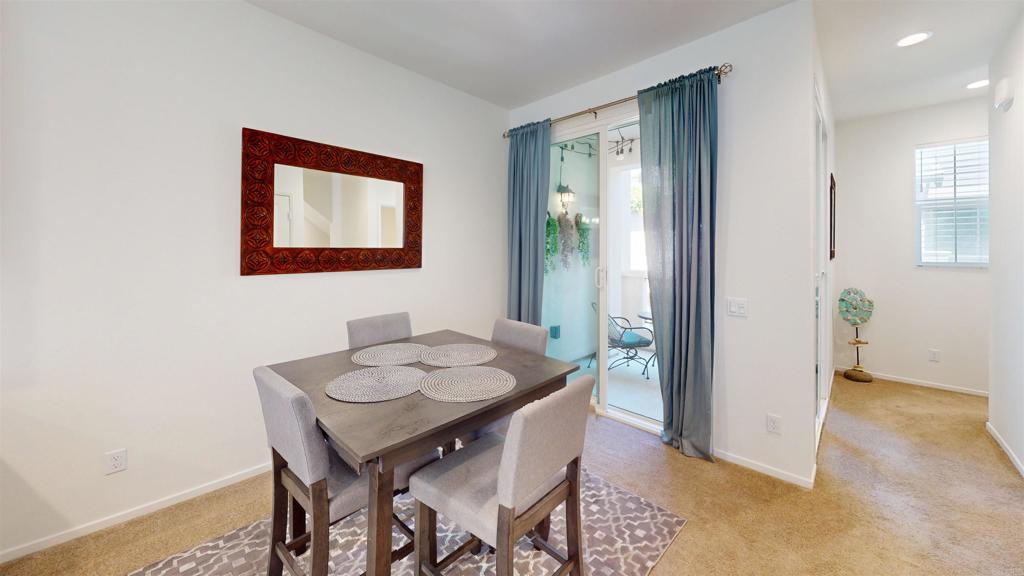 1150 Via Lucero Oceanside, CA 92056 - Photo 7 of 11 a dining room with furniture and window