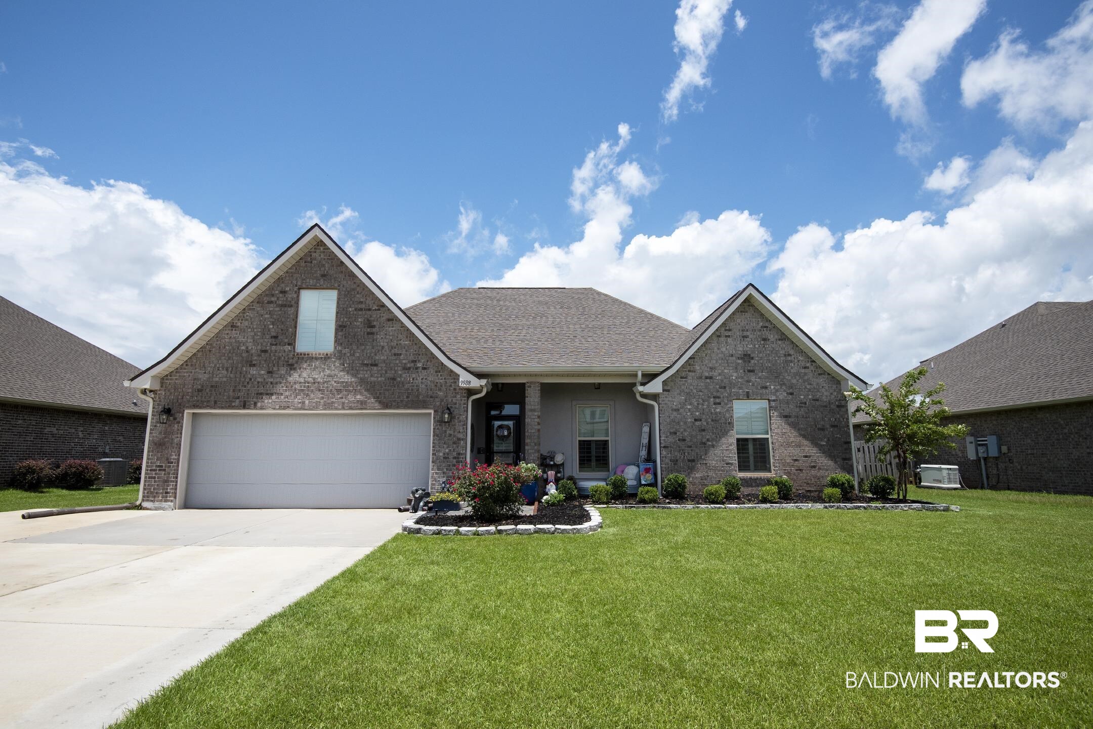 9988 Dunleith Loop Daphne, AL 36526 - Photo 1 of 51 View of front of property with a front lawn and a garage