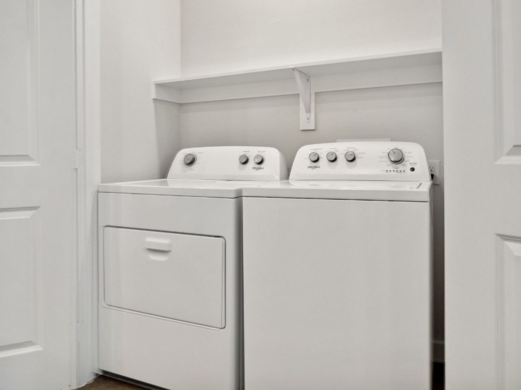 23100 Clay Road, Unit 8203 Katy, TX 77493 - Photo 12 of 29 a utility room with dryer and washer