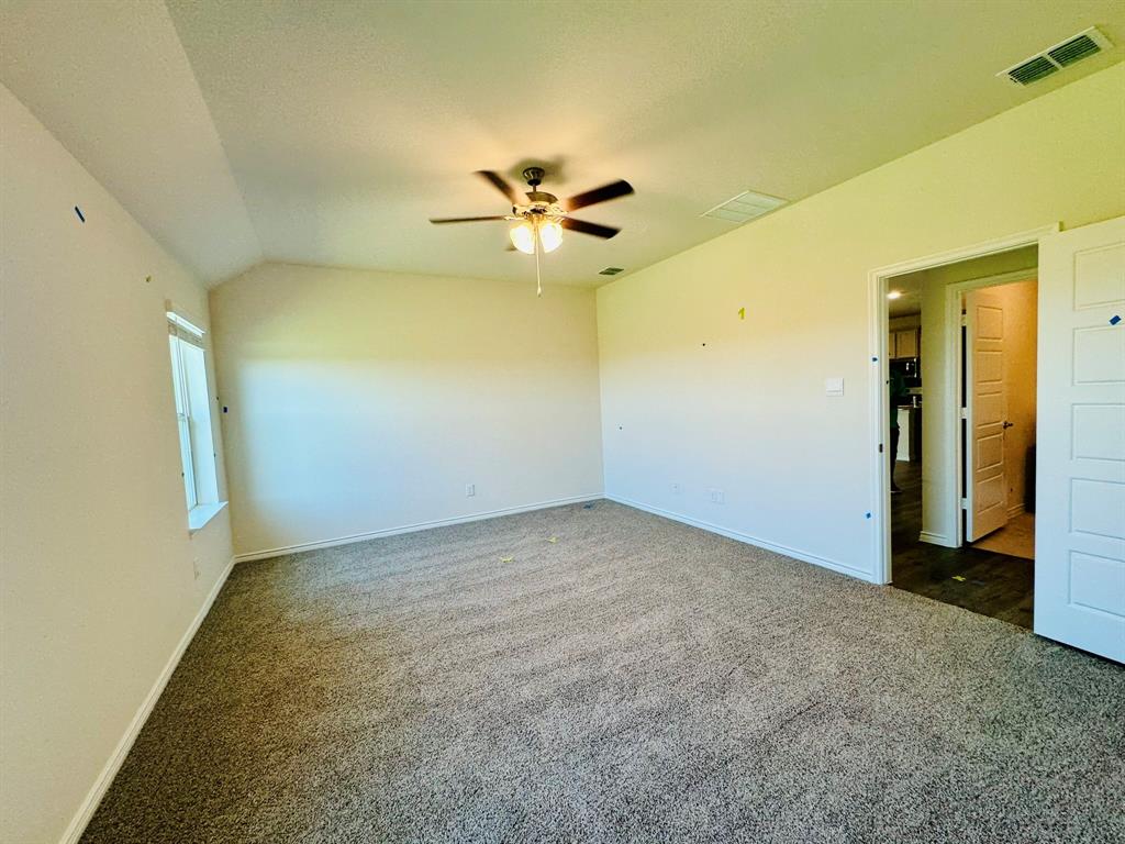 4028 Moss Road Pilot Point, TX 76258 - Photo 12 of 29 a view of a big room with carpet
