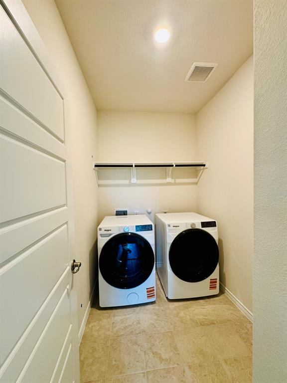 4028 Moss Road Pilot Point, TX 76258 - Photo 16 of 29 a utility room with dryer and washer