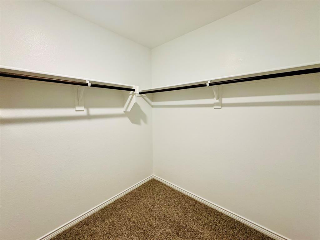 4028 Moss Road Pilot Point, TX 76258 - Photo 18 of 29 a view of small space with racks on the wall