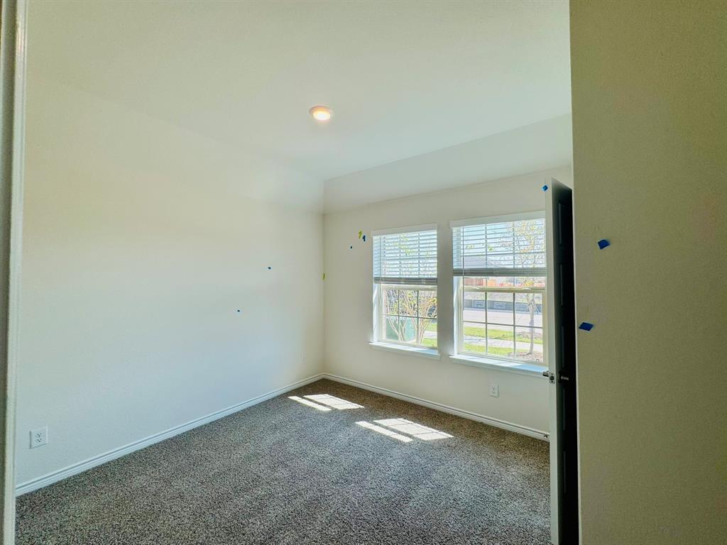 4028 Moss Road Pilot Point, TX 76258 - Photo 19 of 29 an empty room with a window