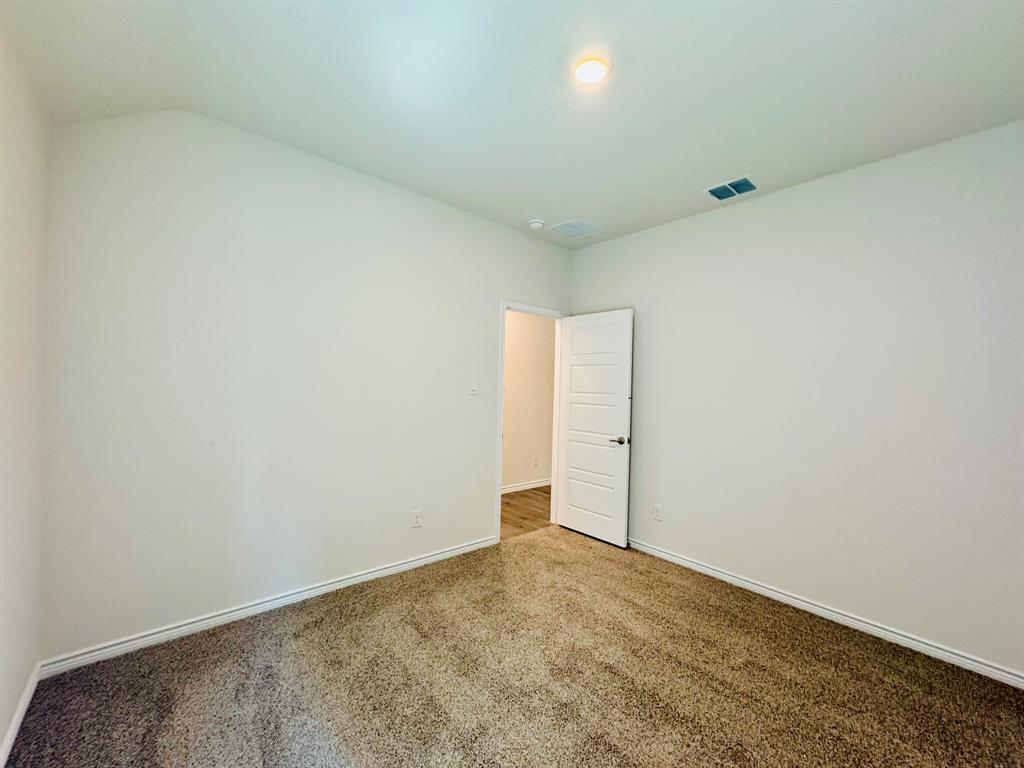 4028 Moss Road Pilot Point, TX 76258 - Photo 22 of 29 a view of an empty room