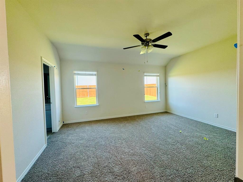 4028 Moss Road Pilot Point, TX 76258 - Photo 6 of 29 a view of n empty room with a window