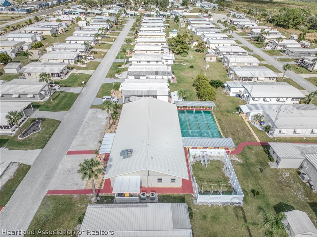 2702 Rodney Street Sebring, FL 33872 - Photo 32 of 33 an aerial view of a multi story building