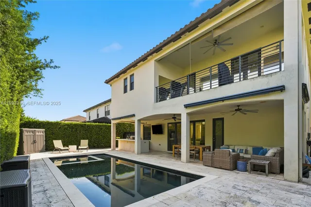a view of a house with a swimming pool
